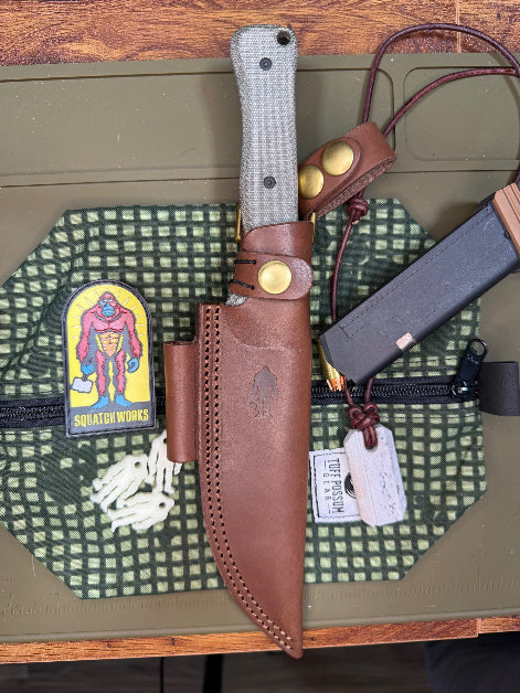 "6-inch bushcraft knife featuring 14C28N steel with cryogenic treatment, micarta handles, designed for durability and precision in outdoor adventures