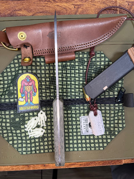 "6-inch bushcraft knife featuring 14C28N steel with cryogenic treatment, micarta handles, designed for durability and precision in outdoor adventures