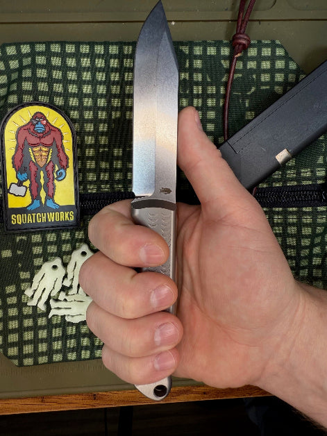Shank Ape knife with a 4-inch MagnaCut steel blade, titanium handle, designed for hunting, self-defense, and everyday carry.